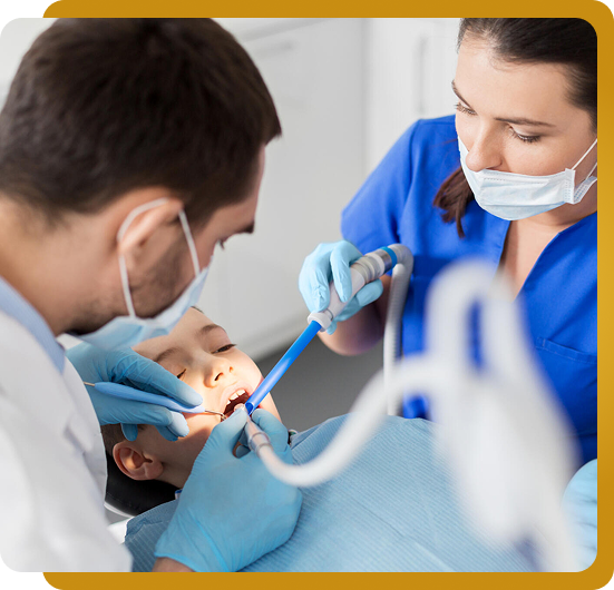 child getting teeth cleaned in dental chair