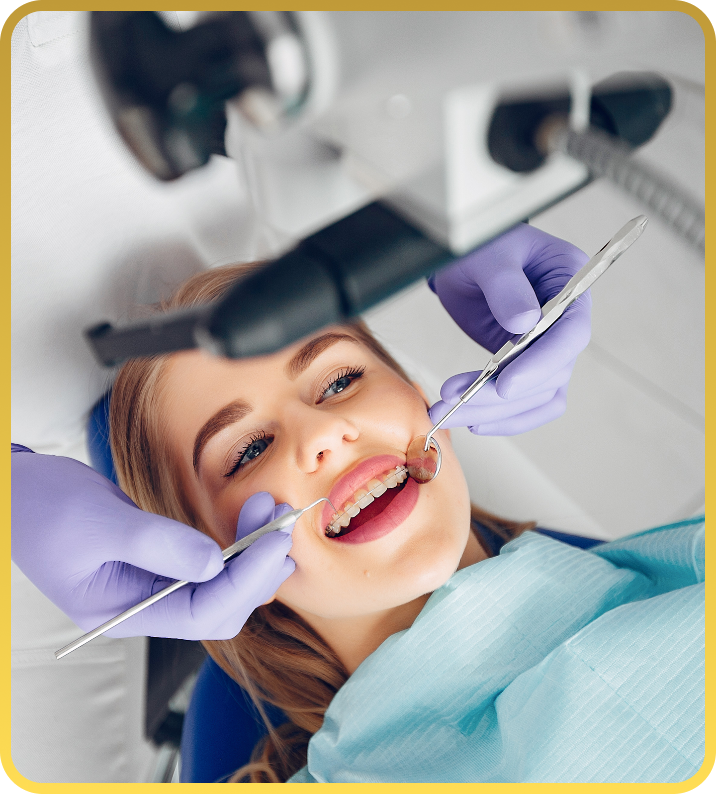 beautiful girl sitting dentist s office.png